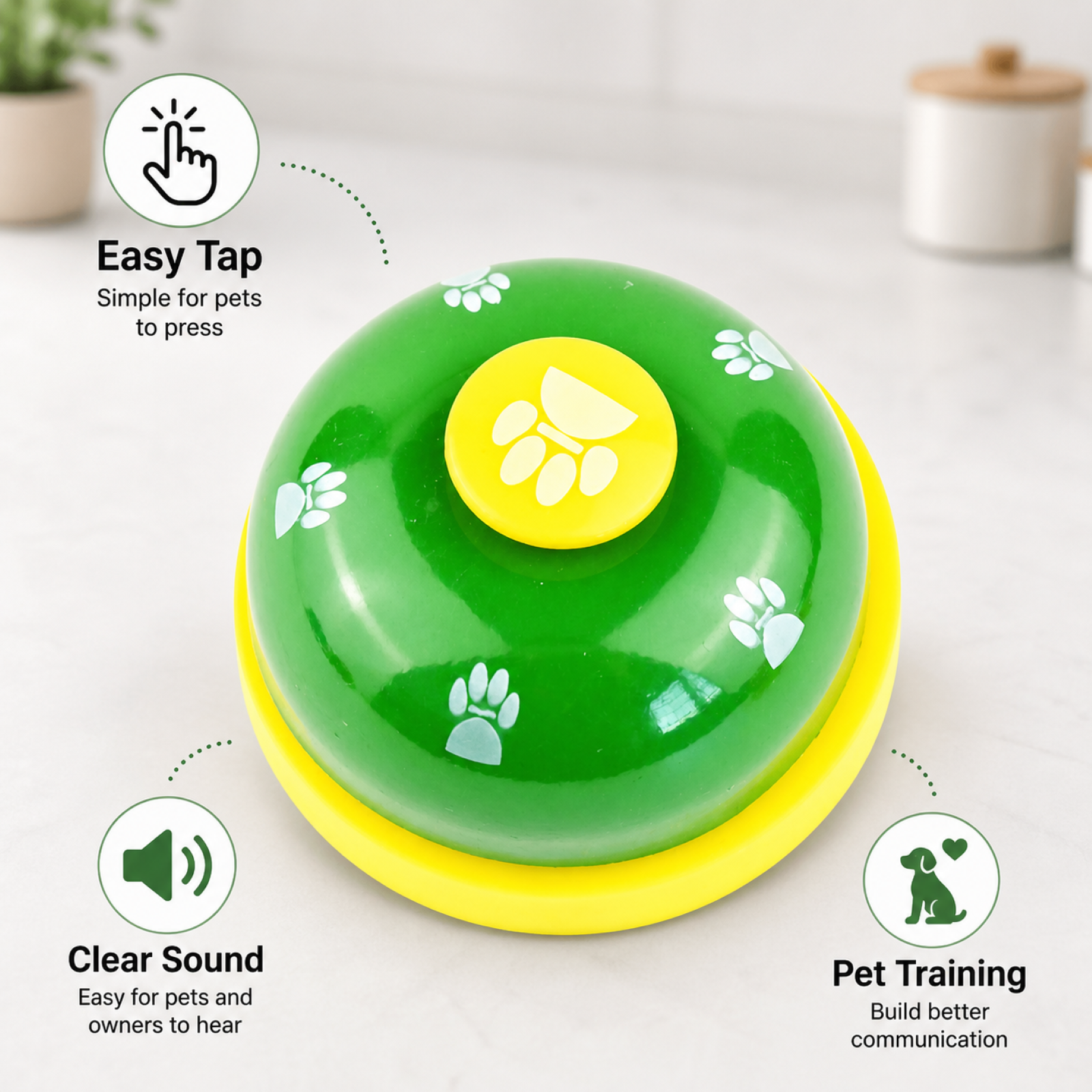 Green dog training bell closeup – stainless steel paw button